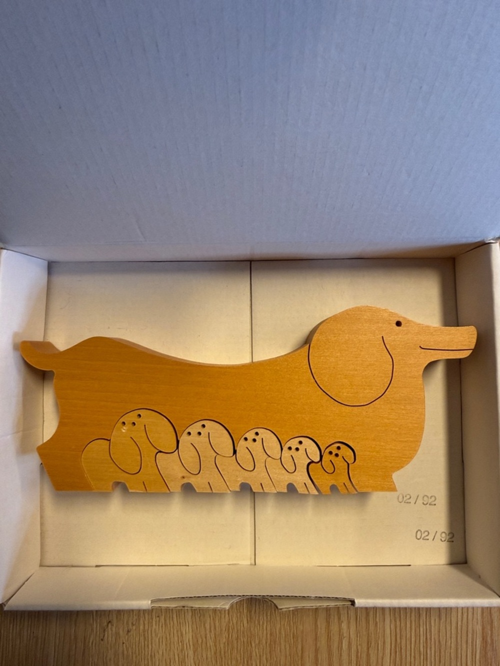 Vintage Naef
"Dachshund-familie" Wooden Puzy